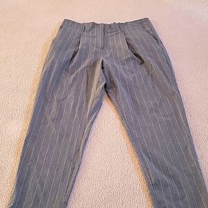 Gray and white stripped pants by Calvin Klein size large.